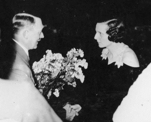 Adolf Hitler congratulates Leni Riefenstahl at the premier of the movie Triumph of the Will
